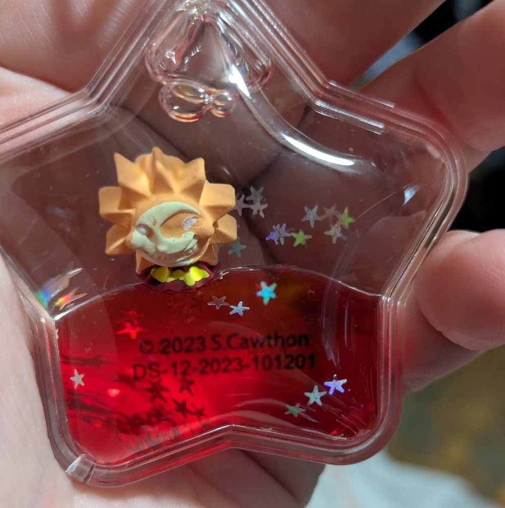 Star-Shaped Red Liquid Keychain